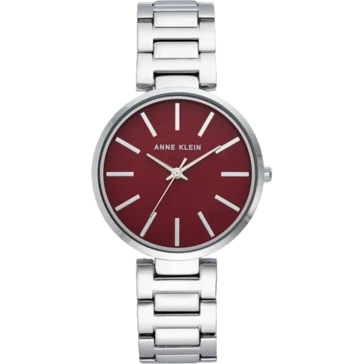 Model ANNE KLEIN 34mm AK-2787BYSV to elegancki zegarek, który przyciąga uwagę głębokim bordowym kolorem tarczy, kontrastującym z chłodnym blaskiem srebrnej bransolety. Minimalistyczny design tarczy z delikatnymi indeksami i wskazówkami podkreśla nowoczesny charakter tego modelu. Koperta o średnicy 34 mm idealnie nadaje się na kobiecy nadgarstek, oferując równowagę między subtelnością a wyrazistością. Mechanizm kwarcowy zapewnia precyzję i niezawodność działania. Model AK-2787BYSV jest doskonałym wyborem na codzienne stylizacje, ale równie dobrze sprawdzi się jako wyrafinowany dodatek na specjalne okazje.