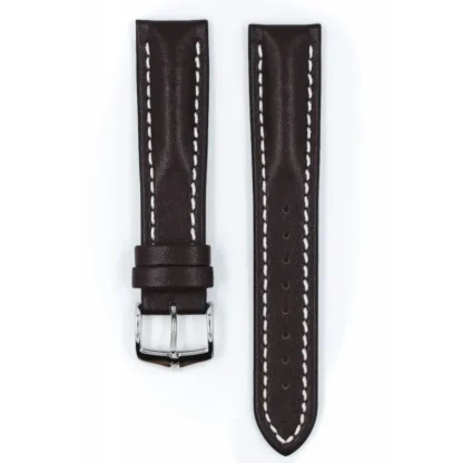 Pasek skórzany **Hirsch Heavy Calf** w kolorze ciemnobrązowym i rozmiarze 20 mm to klasyczna i solidna propozycja dla miłośników trwałości i elegancji. Wykonany z wysokiej jakości cielęcej skóry, cechuje się odpornością na wodę (do 100 metrów) oraz charakterystycznym białym przeszyciem, które dodaje mu sportowego charakteru. Idealny do zegarków o masywnej kopercie i klasycznym designie.