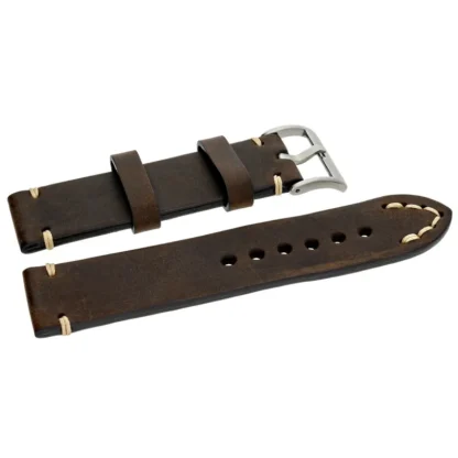Skórzany pasek handmade Tekla 22 mm w brązowym kolorze to rustykalna i stylowa propozycja dla miłośników klasycznych dodatków. Wykonany ręcznie ze skóry naturalnej, oferuje charakterystyczny, surowy wygląd z subtelnymi, beżowymi przeszyciami. Matowa faktura i delikatne postarzenie nadają mu wyjątkowego uroku. Wyposażony w srebrną sprzączkę ze stali nierdzewnej, świetnie sprawdzi się w zestawieniu z zegarkami vintage, wojskowymi oraz outdoorowymi.